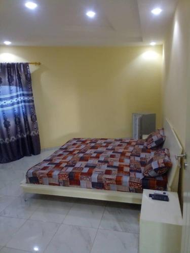 Llit o llits en una habitació de keur fatou