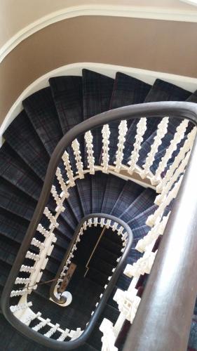 a close up of a spiral staircase in a building at Dryburgh Abbey Hotel in Melrose