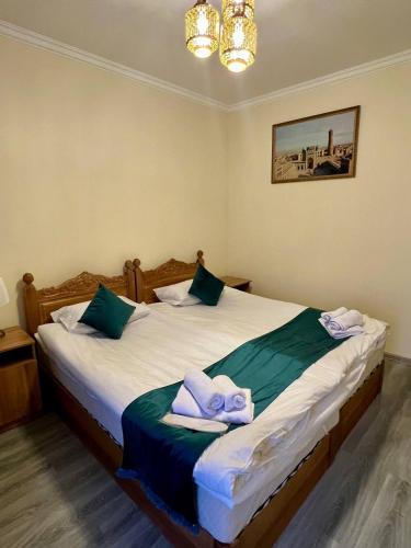 Кровать или кровати в номере Antique Hotel Rizvan