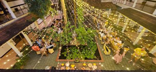 an overhead view of a shopping mall with plants at Kshetra Boutique Retreat Varkala in Varkala