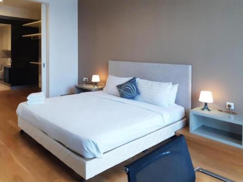 En eller flere senge i et værelse på KLCC Suites at Platinum