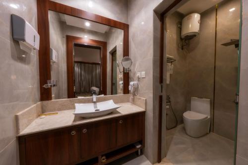 Koupelna v ubytování Msharef Almoden Serviced Apartment