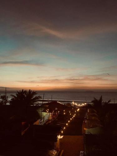 a view of a street with lights at night at Kua's Pad Batangas Kubo in Lian
