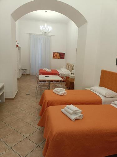 Ένα ή περισσότερα κρεβάτια σε δωμάτιο στο Casa Sorrentina