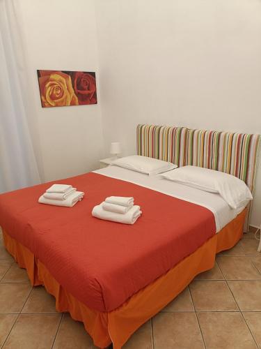 Ένα ή περισσότερα κρεβάτια σε δωμάτιο στο Casa Sorrentina