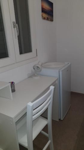 Una cocina o cocineta en NOTE DI MARE