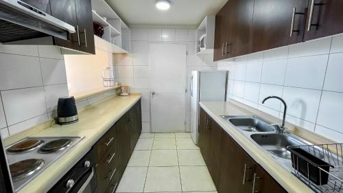 Kjøkken eller kjøkkenkrok på Departamento Costa Norte