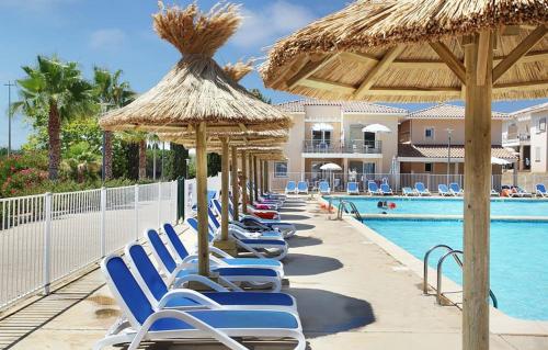 Studio Résidence 3 étoiles Odalys Les Océanides Piscine Plage Argentière parking boite à clé