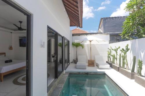 a pool in the backyard of a villa at Beautiful 1-Bedroom-Villa 'Sunflower' in Canggu in Dalung