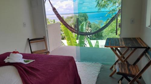 Ένα ή περισσότερα κρεβάτια σε δωμάτιο στο Monkey beach agroturismo