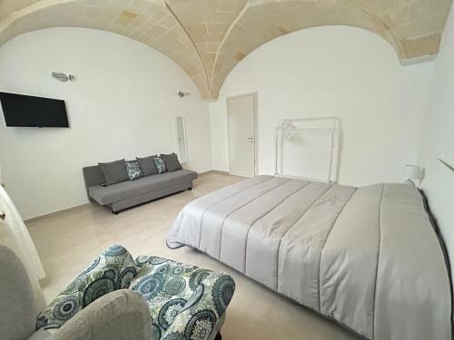 Tempat tidur dalam kamar di Angolo Jonico
