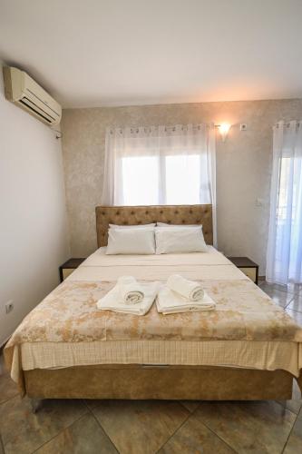 Ένα ή περισσότερα κρεβάτια σε δωμάτιο στο Villa Lux Rajović