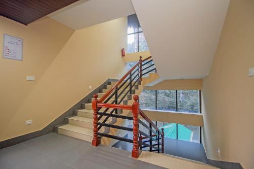 an image of a staircase in a house at The Pahuna Retreat in Gangtok