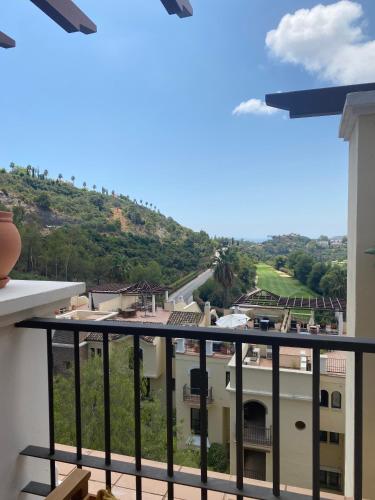 a view from the balcony of a building at Los Arqueros Las Jacarandas in Benahavís