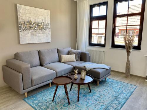 Un lugar para sentarse en discovAIR - Modern & Zentral, INKLUSIVE Parkplatz & Kaffee bis zu 2 Schlafzimmer & Balkon