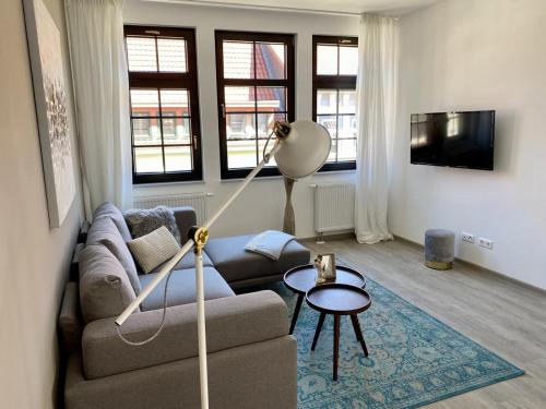 Una televisión o centro de entretenimiento en discovAIR - Modern & Zentral, INKLUSIVE Parkplatz & Kaffee bis zu 2 Schlafzimmer & Balkon