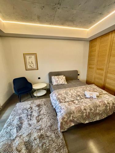 Кровать или кровати в номере smgold lux apartman