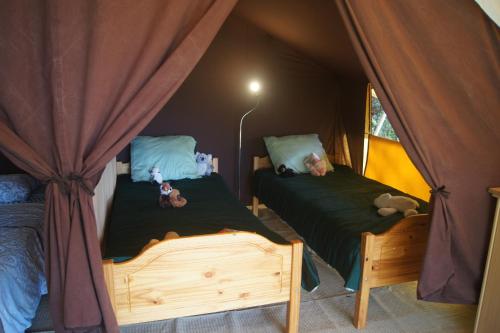 Gallery image of Camping EAU NATURELLE 2 étoiles Bungalow ou Tente 4 personnes dans un environnement calme et dépaysant in Tursac