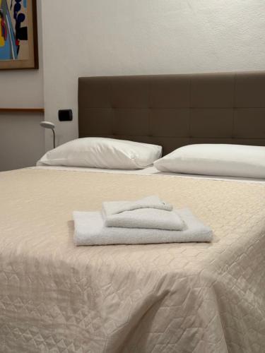 Cama o camas de una habitación en Appartamenti Michela