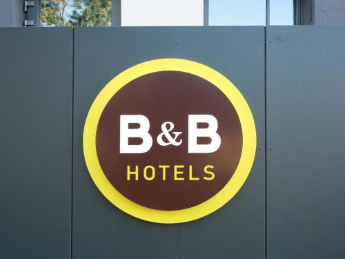 a sign for a b b hotel at B&B Hotel Jena in Jena