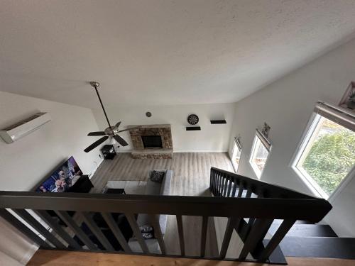an overhead view of a living room with a ceiling fan at Home sweet home in woods in Tobyhanna