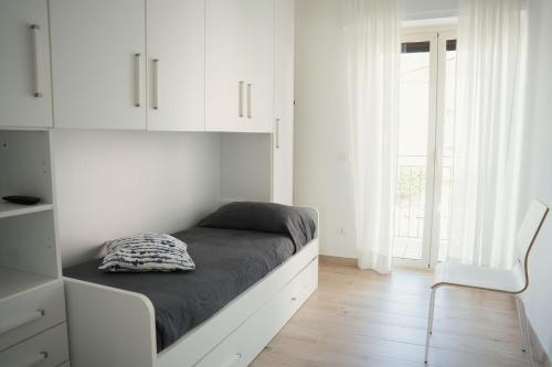 Кровать или кровати в номере Roma Apartment