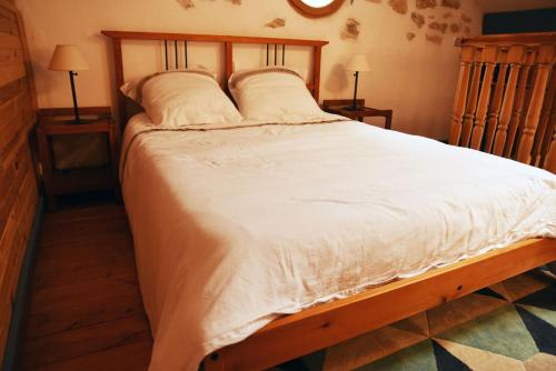 Postel nebo postele na pokoji v ubytování Embarben Maison d'hôtes