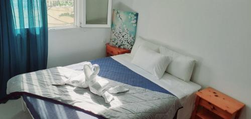 Postel nebo postele na pokoji v ubytování Ammoudaries appartment