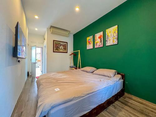 Ένα ή περισσότερα κρεβάτια σε δωμάτιο στο Home4u