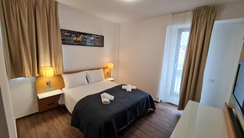 Postel nebo postele na pokoji v ubytování Jafar Resort 4