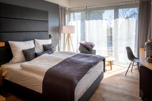 Una cama o camas en una habitación de Overkamp