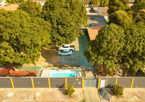 Vaizdas į baseiną apgyvendinimo įstaigoje Mango View Apartamento arba netoliese