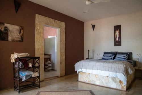 Postel nebo postele na pokoji v ubytování Villa Oasis