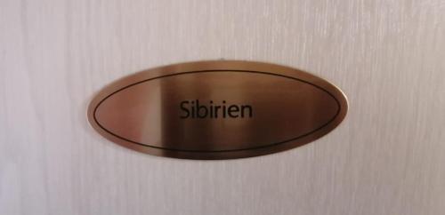 a sign on a wall with the word slutter on it at Gästehaus Burg Molbach in Kreuzau