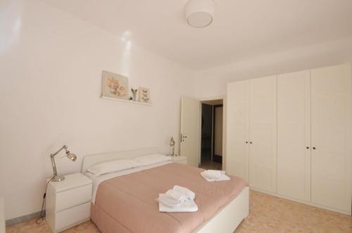Posteľ alebo postele v izbe v ubytovaní Feeling Home