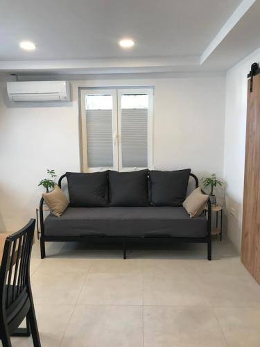 Ruang duduk di Bella Vista apartment 2