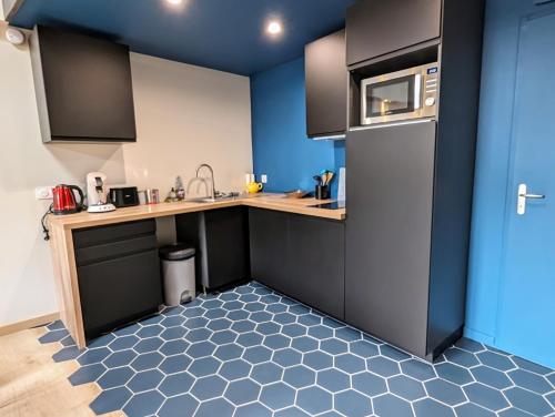 Η κουζίνα ή μικρή κουζίνα στο Loft d'Albenas - Clim et Bain