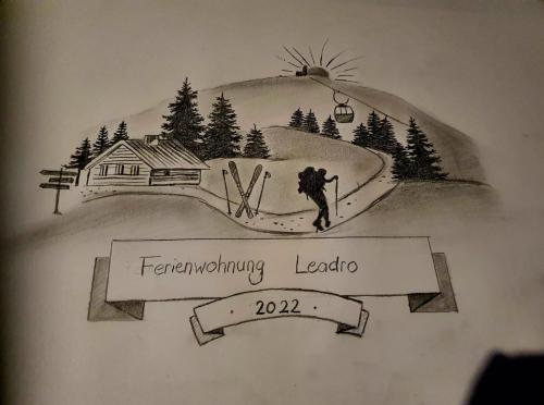 a drawing of a person on a snow covered mountain at Ferienwohnung Leadro in Kurort Oberwiesenthal