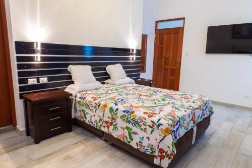 Cama o camas de una habitación en HOTEL BAMBOO
