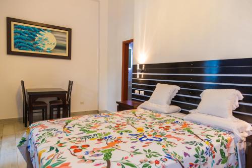 Cama o camas de una habitación en HOTEL BAMBOO