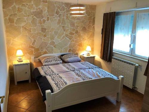 Postel nebo postele na pokoji v ubytování Apartments Engel with Pool