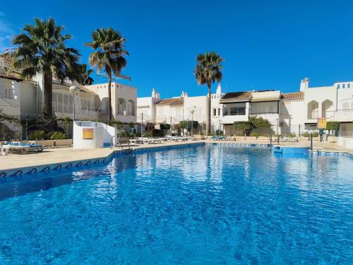 The swimming pool at or close to Medina Marinas - Tú hogar con solarium privado!