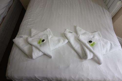 Postel nebo postele na pokoji v ubytování Charlie Hotel
