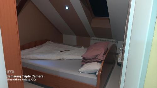 Postel nebo postele na pokoji v ubytování Fly