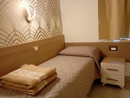 Ліжко або ліжка в номері Da Mario Affittacamere