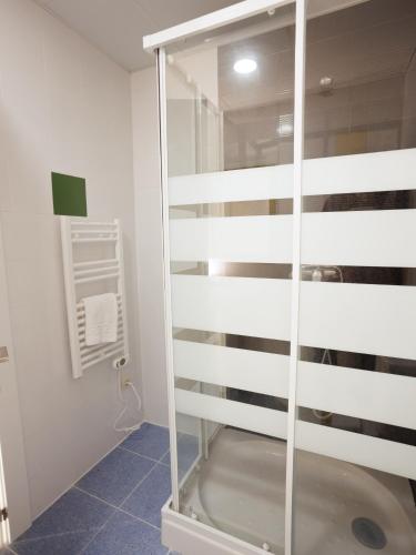 Vonios kambarys apgyvendinimo įstaigoje Habitación Villanubla