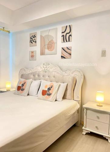 Llit o llits en una habitació de Azure Residences - EA
