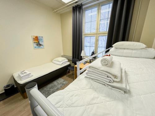 Postel nebo postele na pokoji v ubytování Hostel Hermanni