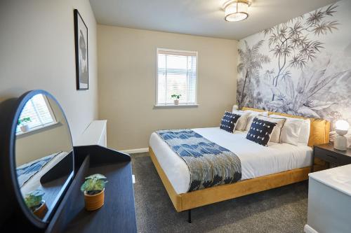 Postel nebo postele na pokoji v ubytování Cosy Coastal Apartment 1