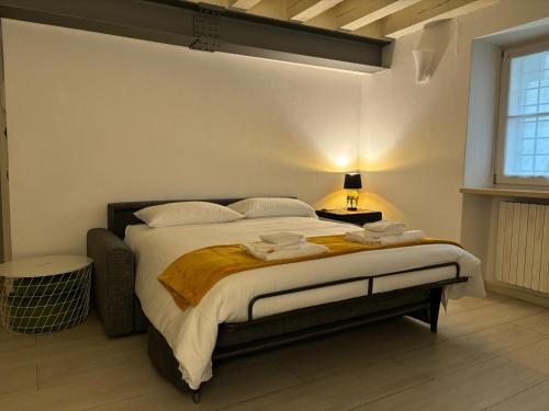 a bedroom with a large bed in a room at SanPietro in Verona